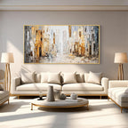 Abstract cityscape wall art with gold frame displayed above a sofa in a modern living room