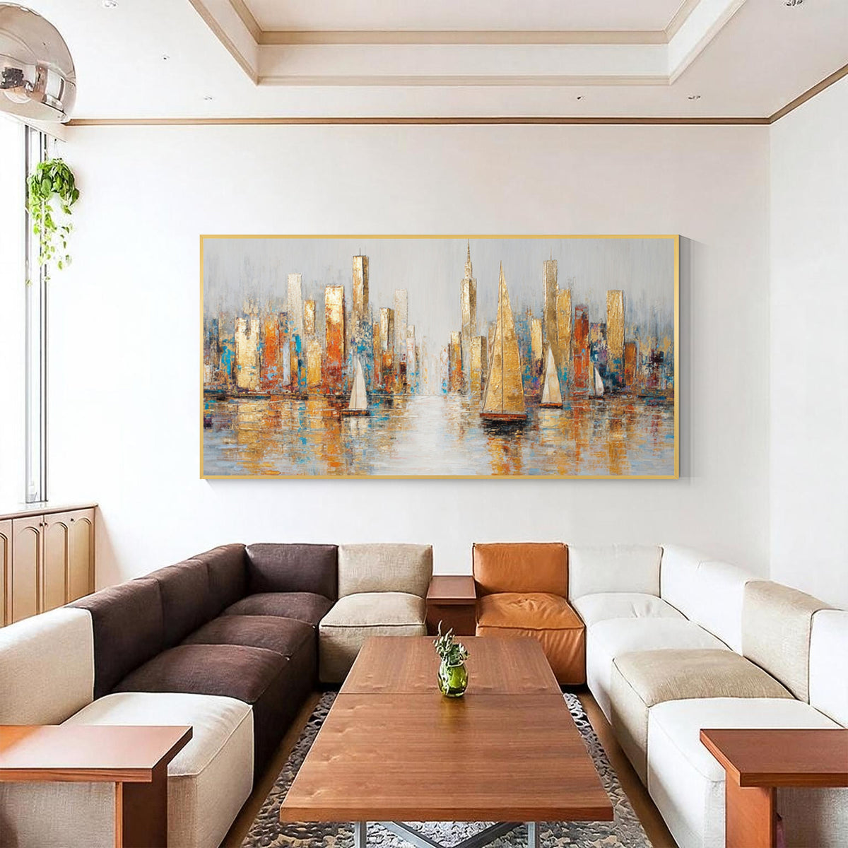 Abstract cityscape and sailboat wall art with gold frame displayed in a modern living room entryway