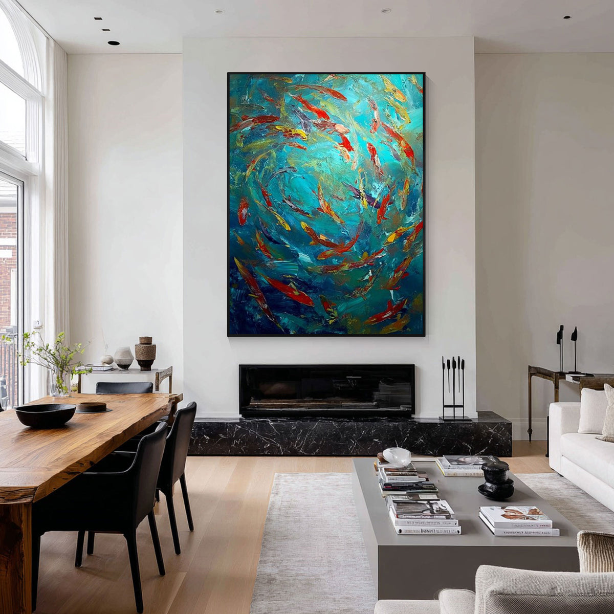 Abstract school of fish wall art with black frame displayed above a fireplace in a modern living room