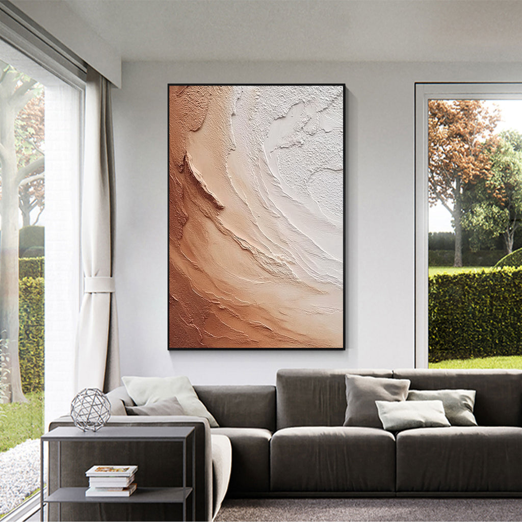 Beige and brown textured abstract wall art with black frame displayed in a modern living room, featuring layered organic patterns and minimalist contemporary interior decor