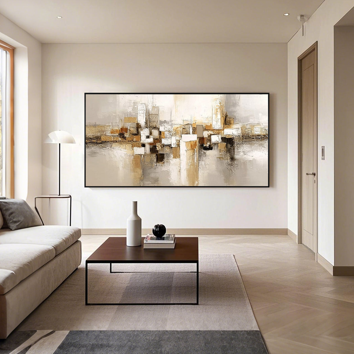 Beige gold geometric abstract wall art with black frame in a modern living room, horizontal textured canvas painting with neutral tones and contemporary home decor style