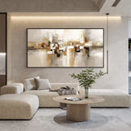Beige gold geometric abstract wall art with black frame displayed in a modern living room, textured canvas painting with neutral tones and contemporary design