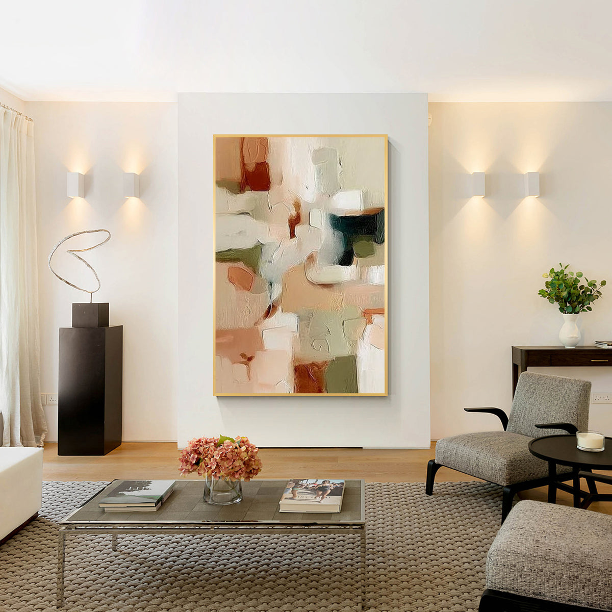 Beige and green abstract wall art with gold frame in a modern living room interior