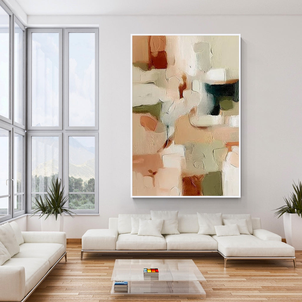 Beige and green abstract wall art with white frame displayed in a modern living room interior