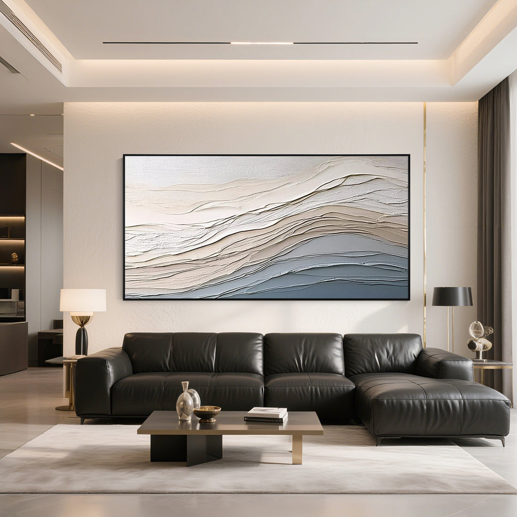 Black frame neutral textured abstract wall art displayed above a modern living room sofa