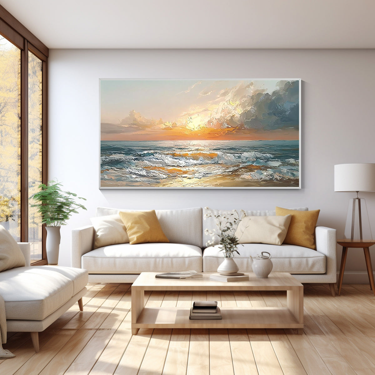 Coastal ocean wall art painting displayed above a sofa in a modern living room interior