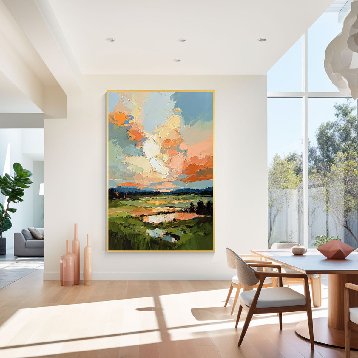Colorful abstract landscape painting with gold frame featuring textured oil brush strokes, displayed in a modern home interior