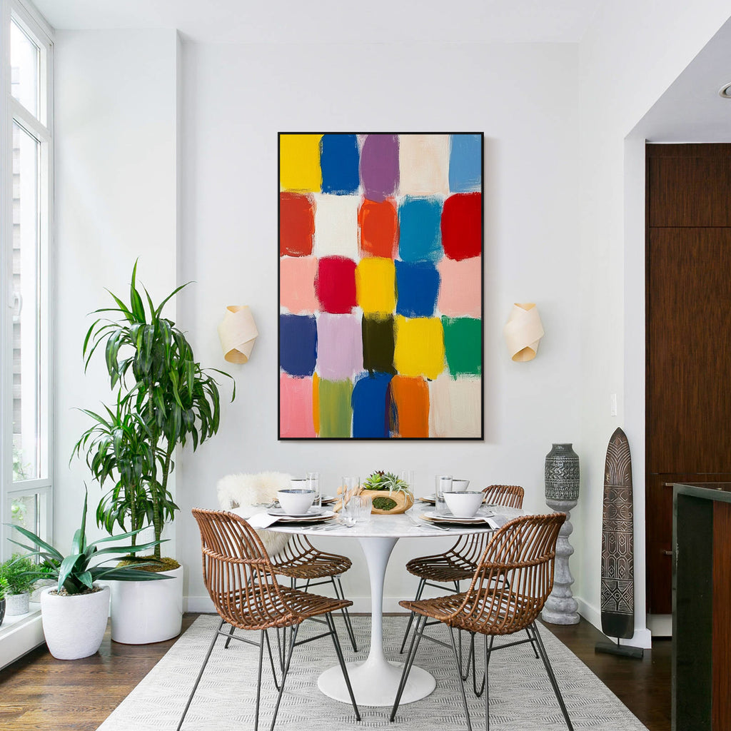 Colorful block abstract wall art with black frame displayed in a modern dining room, featuring vibrant color squares, textured brush strokes and contemporary interior decor