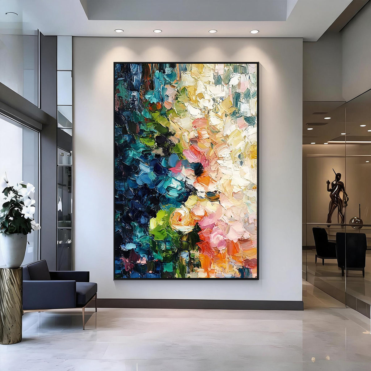 Colorful blue green pink and orange textured abstract wall art with black frame displayed in a modern living room, featuring layered brush strokes and contemporary interior design
