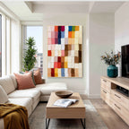 Colorful geometric textured abstract wall art displayed in a modern living room, featuring multicolor blocks, layered paint texture and contemporary home decor style