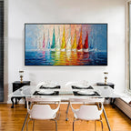 Colorful sailboat wall art with black frame displayed in a modern dining room, featuring vibrant sailboats and textured reflections on blue water