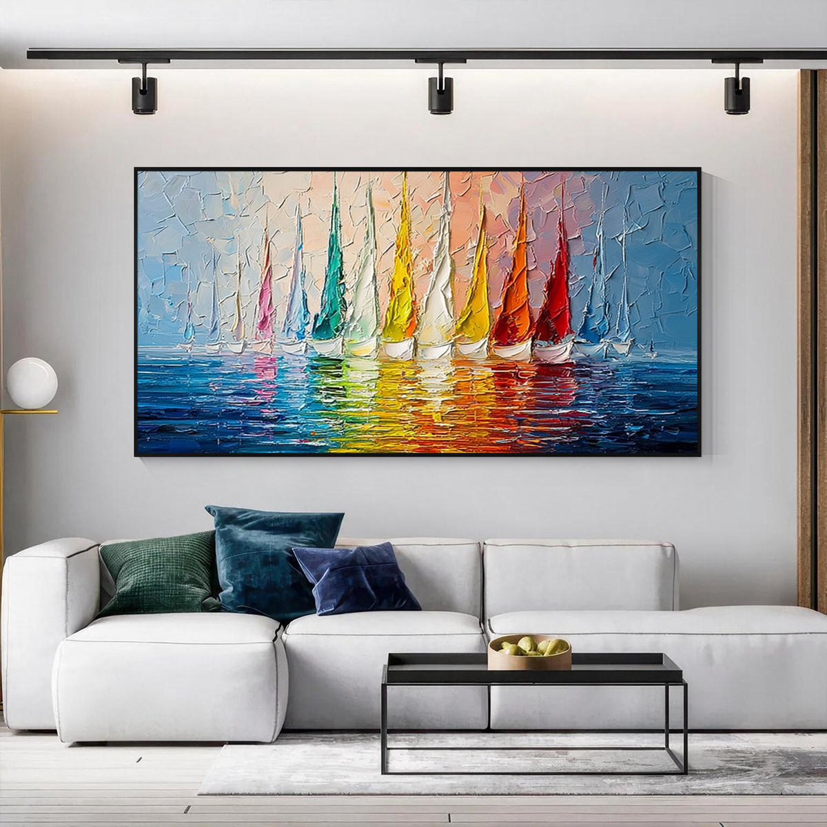 Colorful sailboat wall art with black frame displayed in a modern living room, featuring vibrant sailboats, blue water and textured brushwork