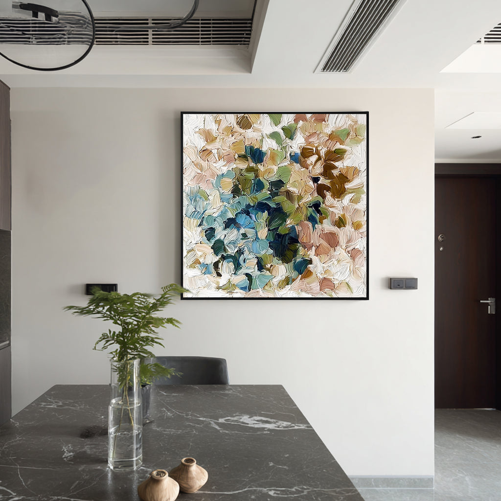 Colorful textured abstract wall art displayed in a modern dining area interior