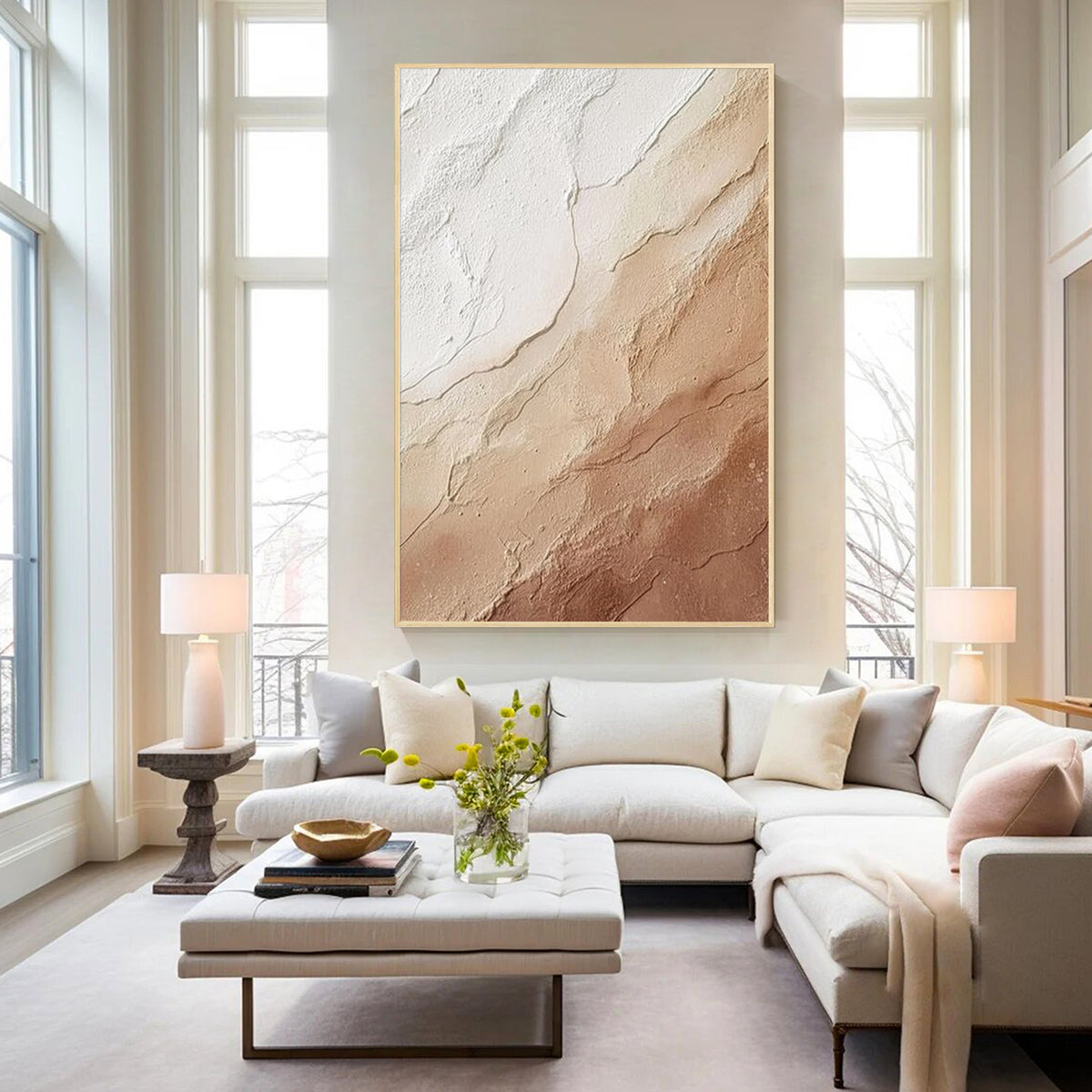 Cream beige textured abstract wall art with gold frame, minimalist plaster texture painting displayed in a bright luxury living room