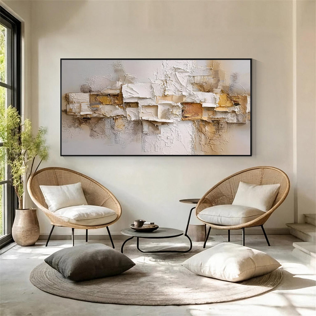 Cream and beige layered relief textured abstract wall art with black frame in a modern lounge