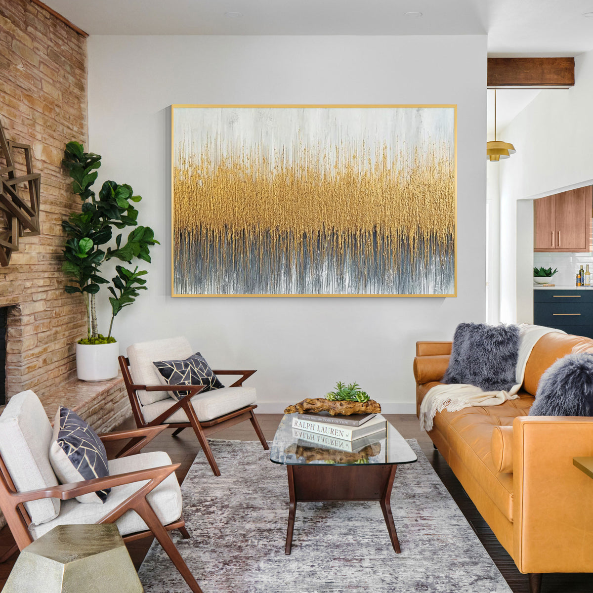 Gold textured abstract canvas wall art displayed in a modern living room interior