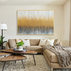 Gold textured abstract wall art displayed above a sofa in a modern living room interior decor
