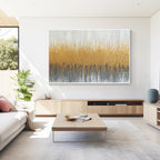 Gold textured abstract wall art displayed in a modern minimalist living room