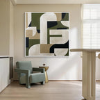 Green beige geometric abstract wall art with white frame displayed in a modern minimalist home interior, contemporary wall decor