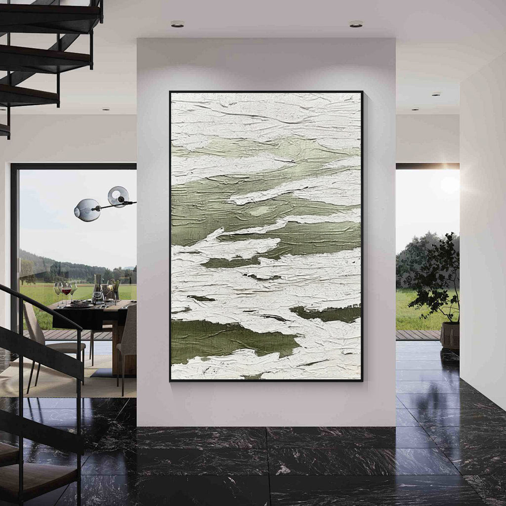 Green and white textured abstract wall art with black frame displayed in a modern interior, featuring layered organic patterns and minimalist contemporary design