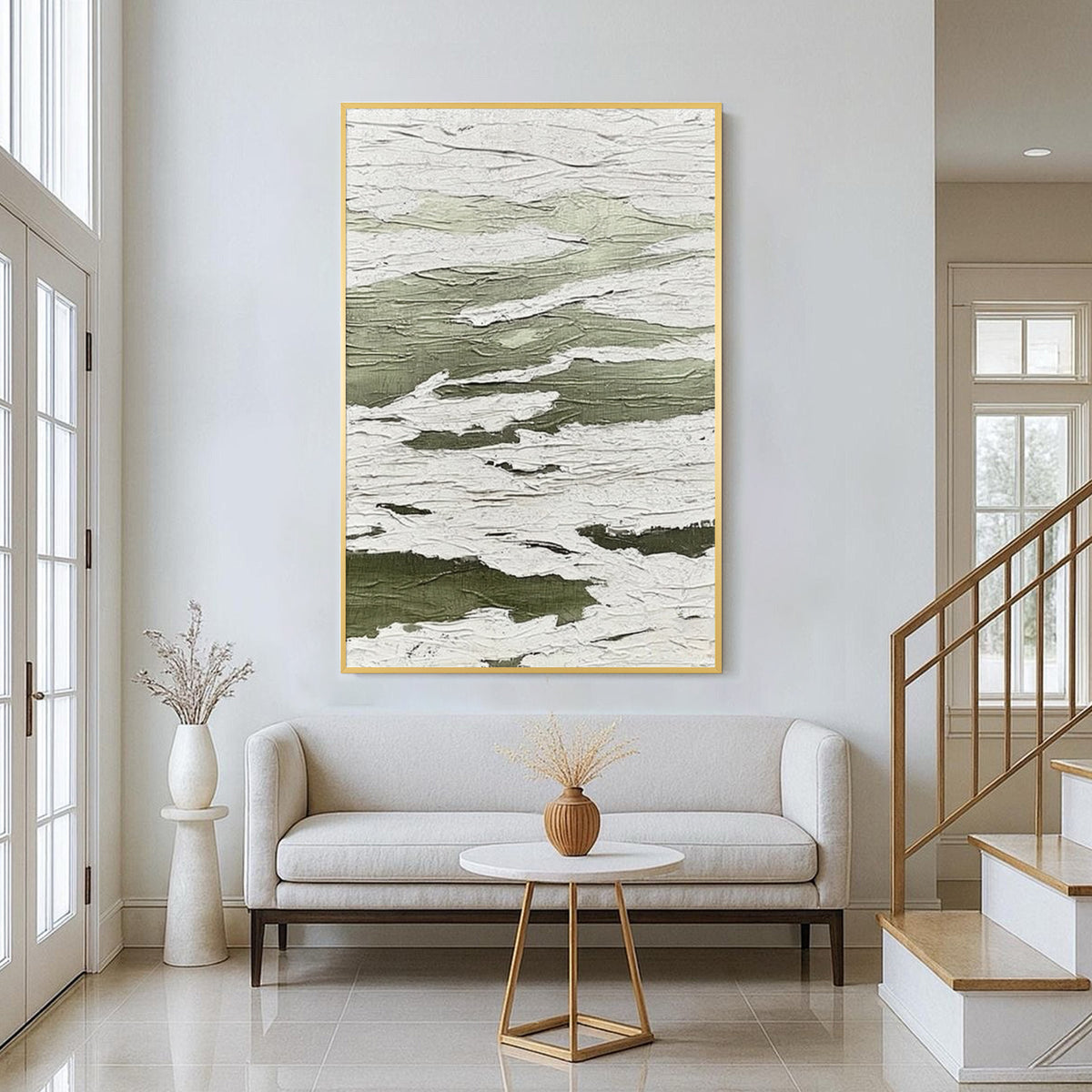 Green and white textured abstract wall art with gold frame displayed in a modern entryway, featuring layered organic patterns and minimalist contemporary home decor