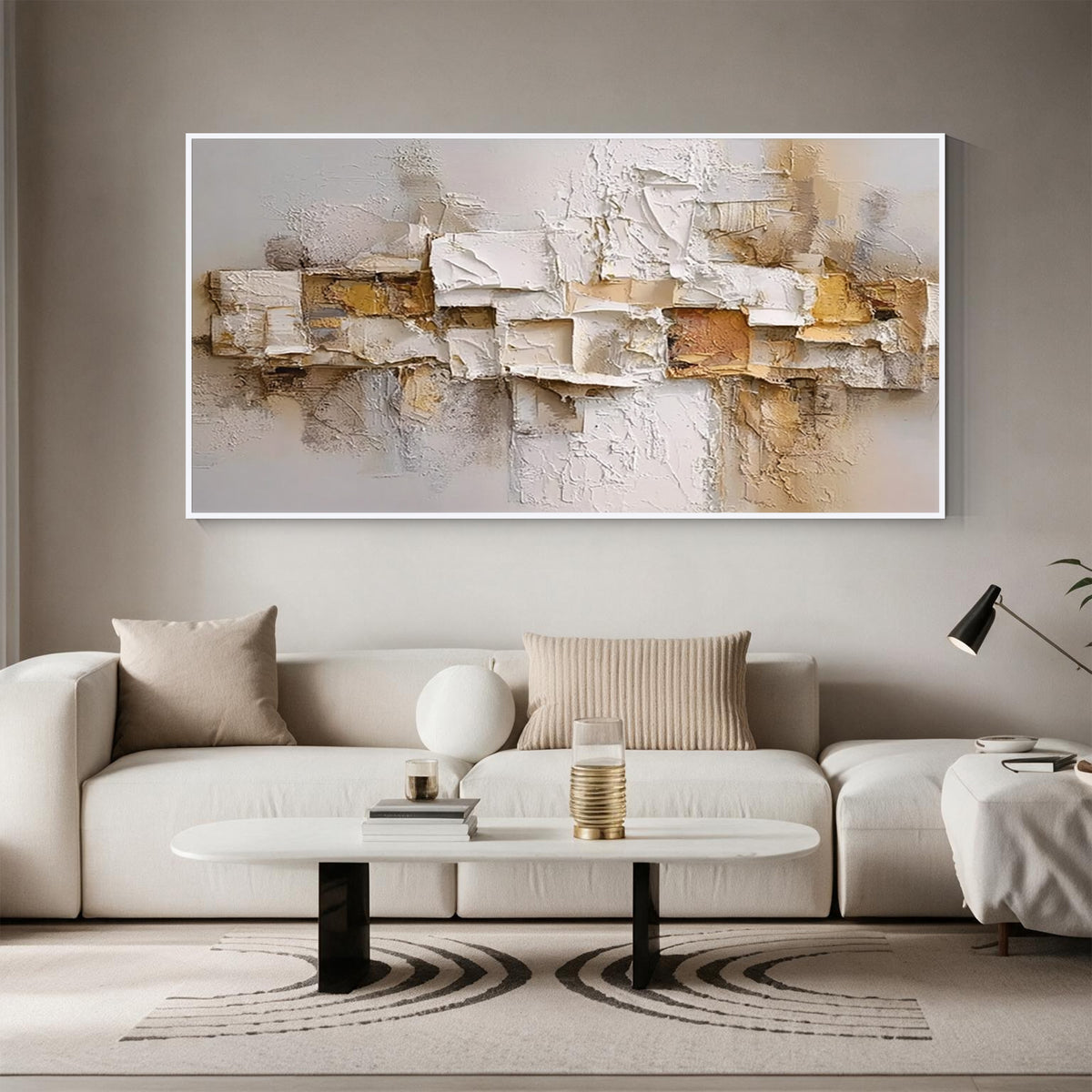 Layered relief textured abstract wall art with white frame above a modern sofa in a neutral living room