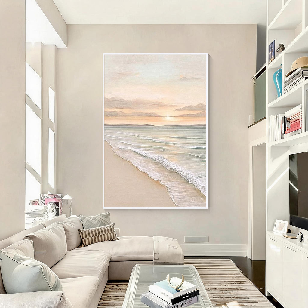 Minimal coastal ocean painting with white frame displayed in a bright modern living room interior
