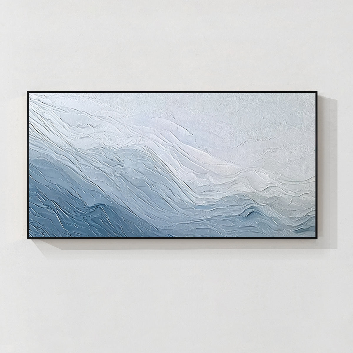 Modern blue textured abstract wall art painting with flowing wave patterns in a black frame