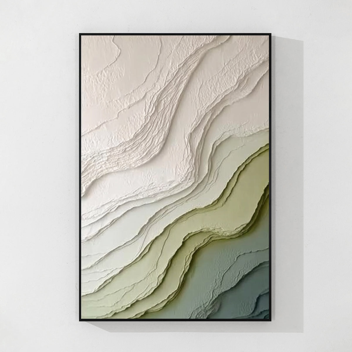 Modern green and beige abstract canvas art with black frame featuring textured layers and minimalist wall decor style