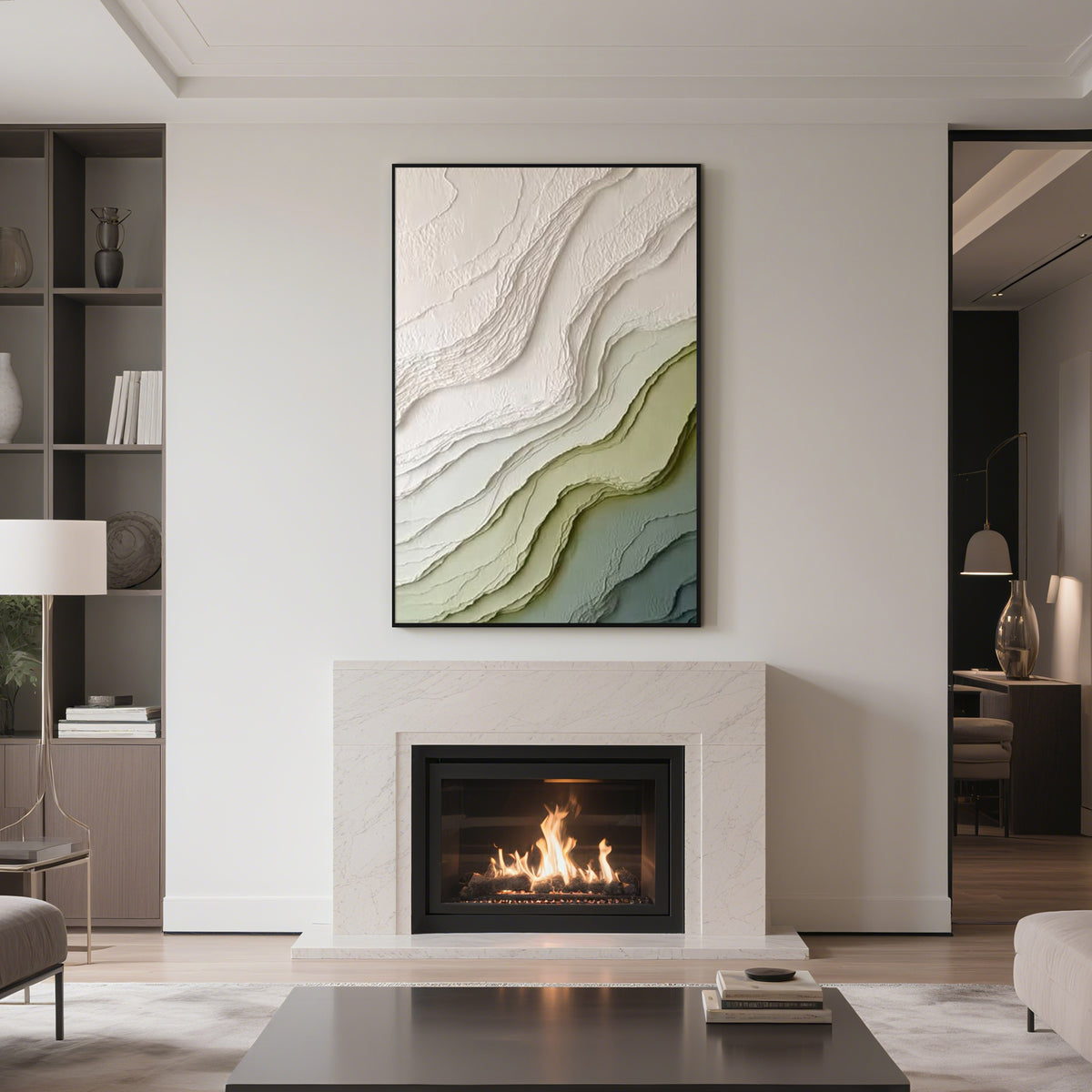 Modern green and beige textured abstract wall art with black frame displayed above a fireplace, featuring layered organic patterns in a contemporary living room