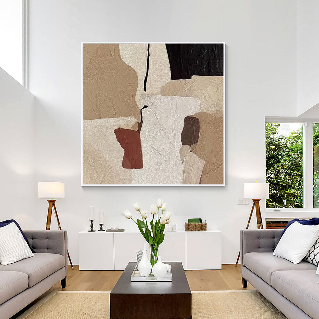 Modern neutral textured abstract wall art displayed above a sofa in a contemporary living room interior