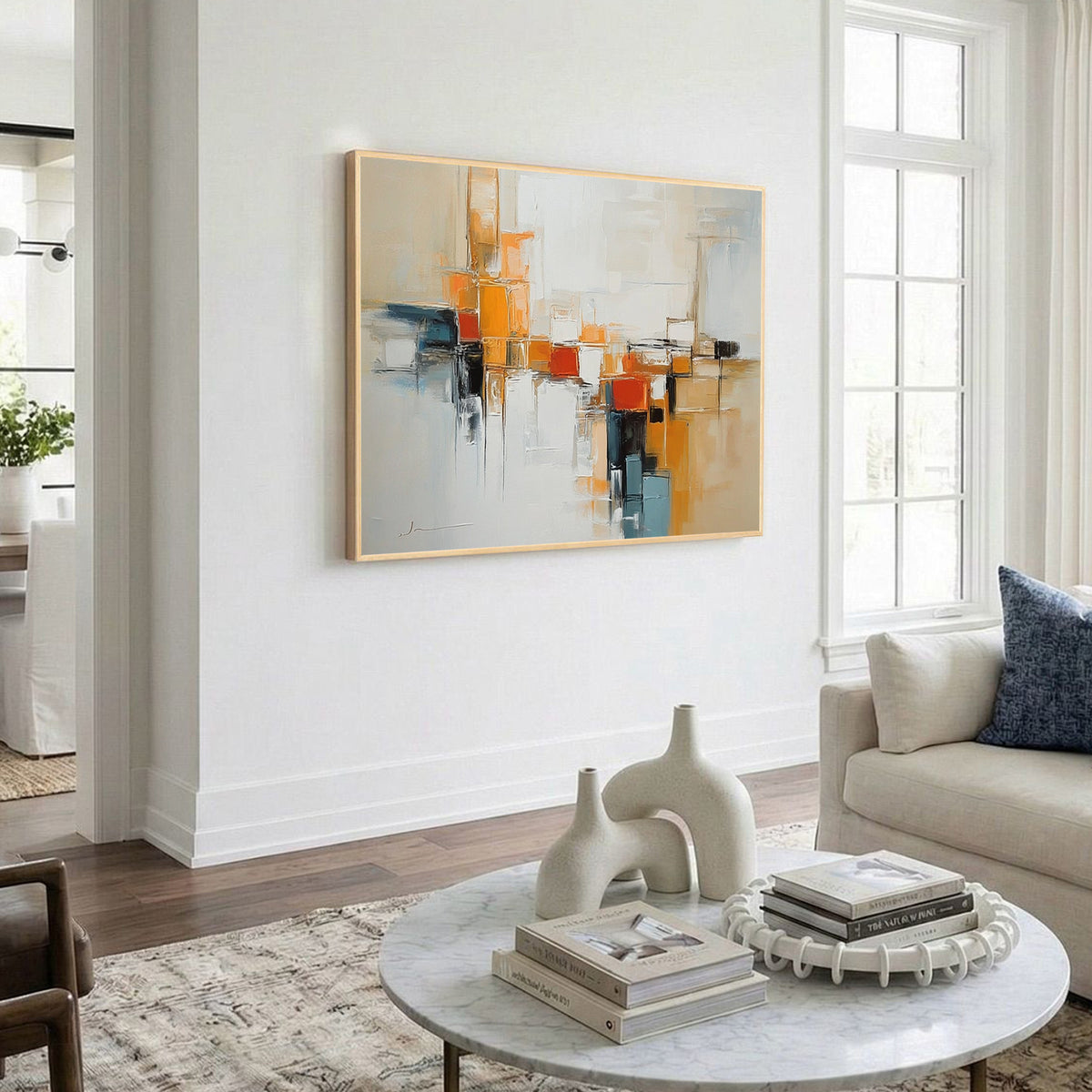 Neutral abstract geometric canvas wall art featuring orange and blue accents with modern textured painting for contemporary living room decor