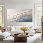 Neutral abstract textured wall art displayed in a modern living room above a sofa