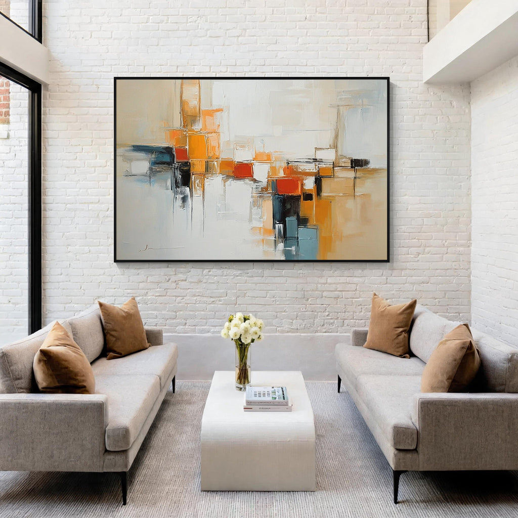 Neutral orange geometric abstract wall art with black frame displayed in a modern living room, featuring textured abstract painting and contemporary interior decor