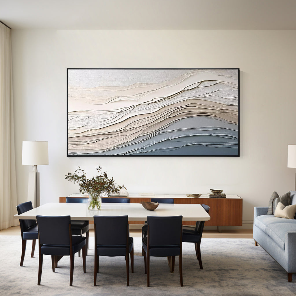 Neutral textured abstract wall art with black frame displayed in a modern dining room