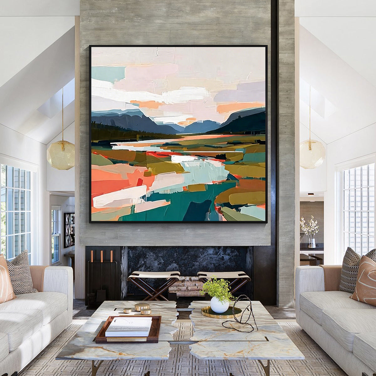 Soft color abstract landscape wall art with black frame displayed above a fireplace in a modern living room, featuring layered fields, mountains and contemporary brush strokes