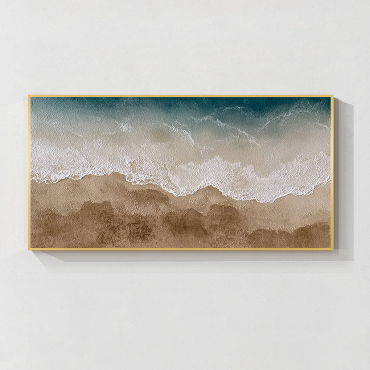 Textured ocean wave and beach wall art with gold frame in teal blue and sandy beige tones