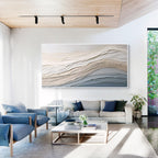 White frame neutral textured abstract wall art displayed in a modern living room above a sofa